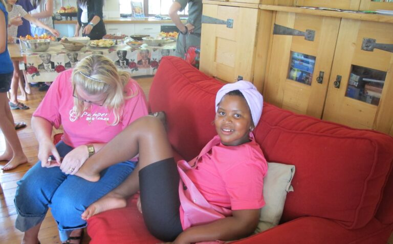 pamper party for lerato on a red couch