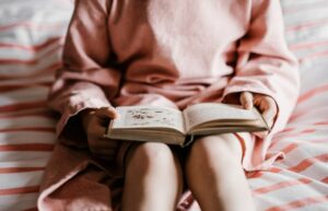 reading book on lap