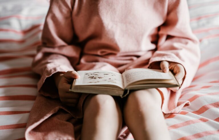 reading book on lap