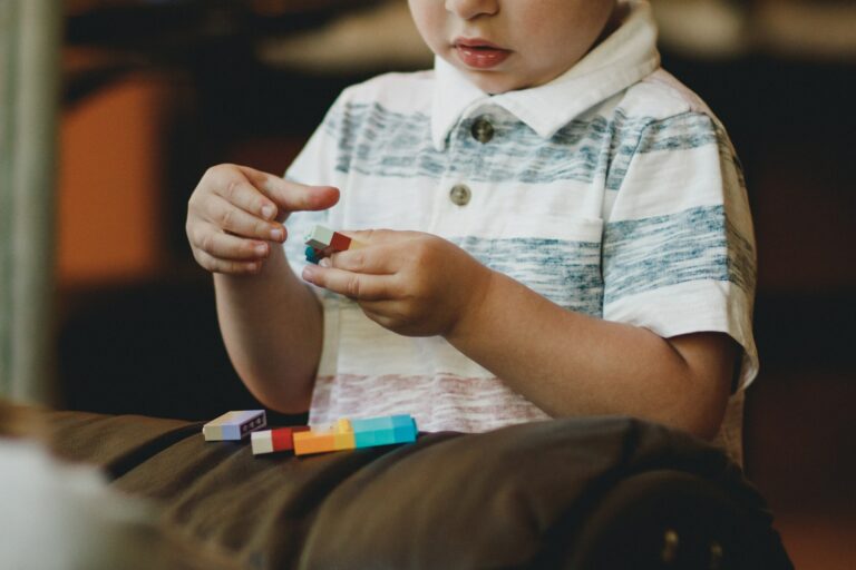 autism boy making something