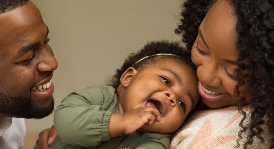 grateful parents with toddler